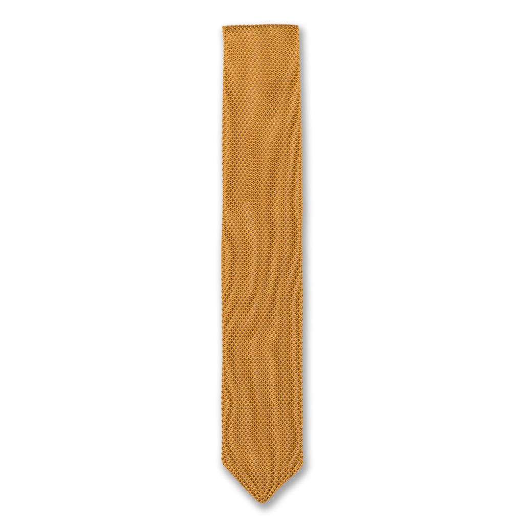 A wide range of gold and yellow knitted ties in a variety of shades